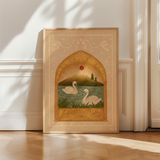 Framed fine art print of two white swans on a teal sparkly lake under a red moon and a golden arch. Angel wings and stars above and grape vines and an eye below.